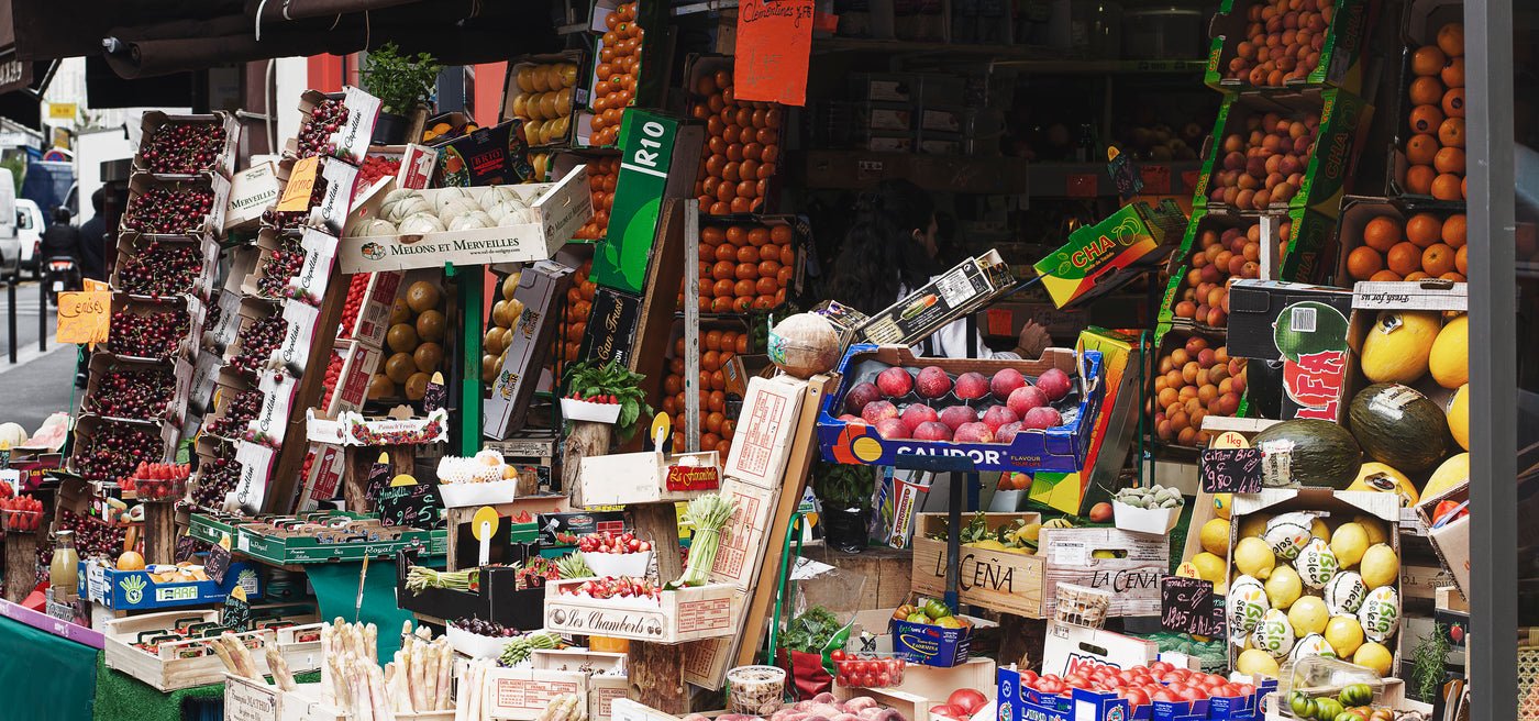 Fruit and vegetables for sale at a grocery stall, Tesco marketplace management for UK grocery brands
