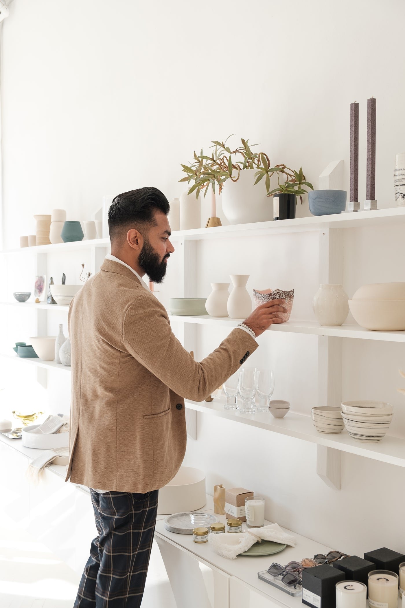 Man browsing home goods in a homeware store